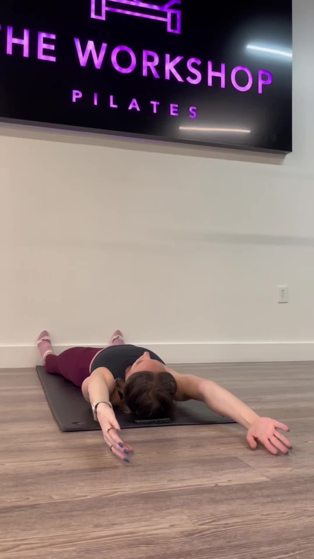 Wall Pilates Roll Up preview |  Women's Health
